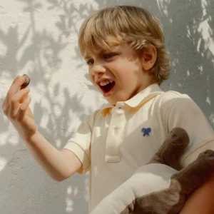 Polo kids liso logo rizo